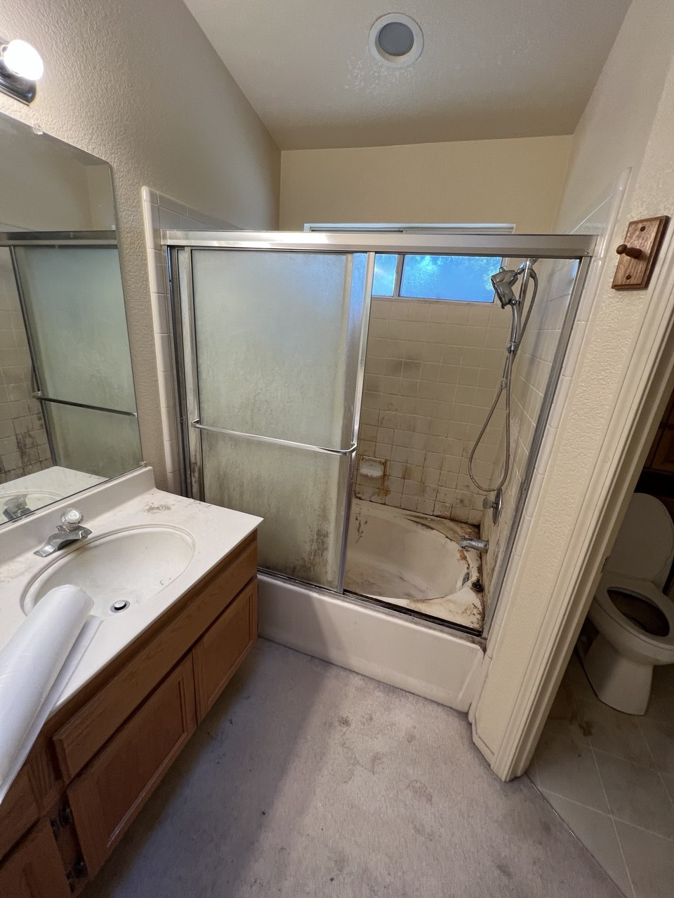 Primary bathroom remodel with double vanity and glass shower