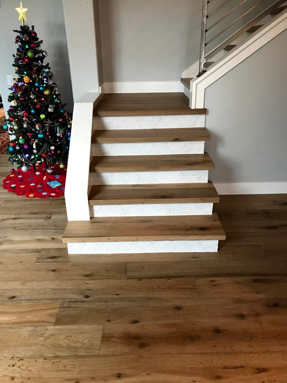 Staircase with custom risers and hardwood treads